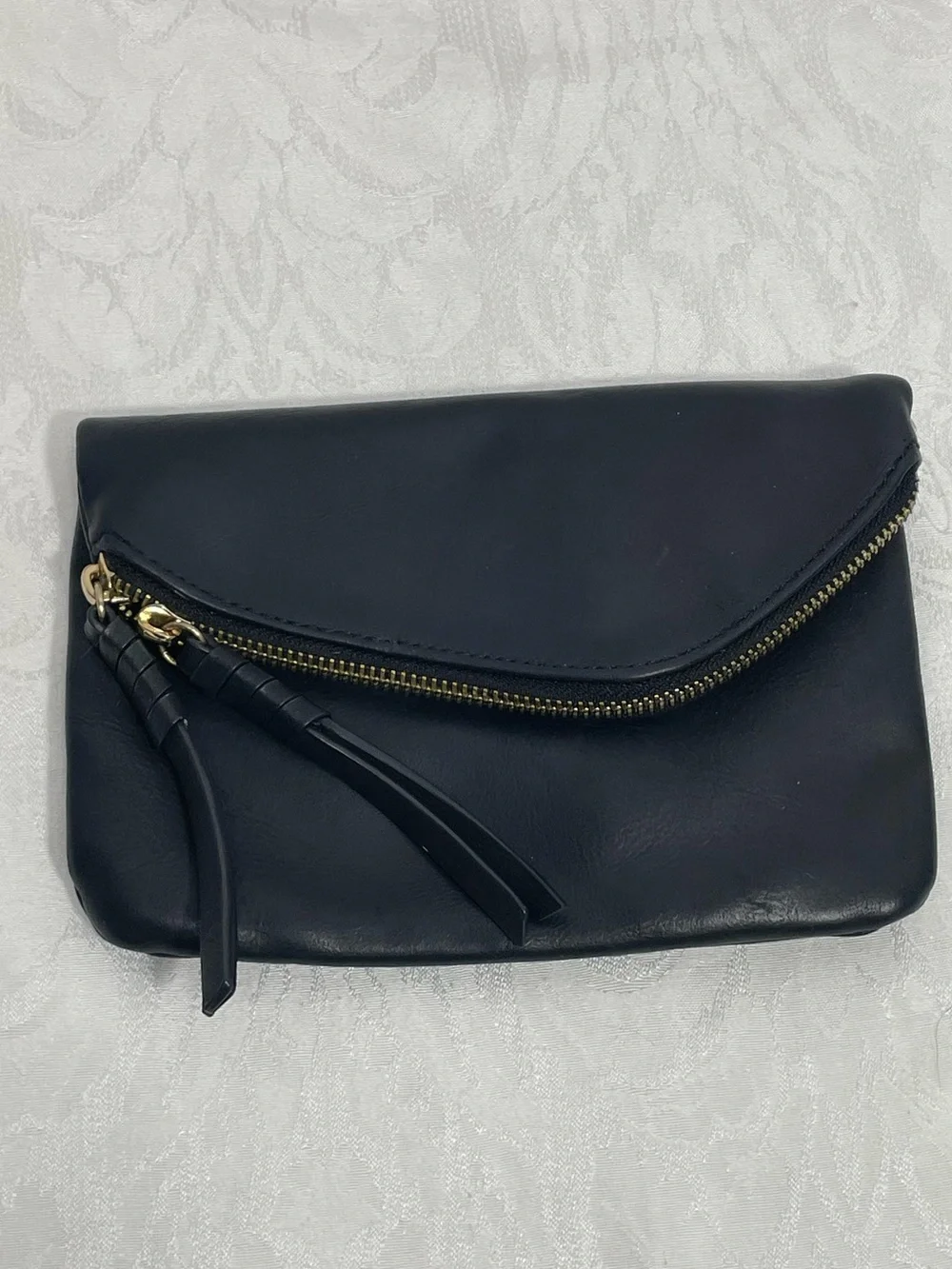 Street Level Black Vegan Leather Fold-Over Clutch with Gold Zip Accent.